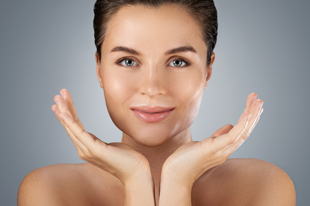 Portrait,Of,Young,Beautiful,Woman,With,Perfect,Skin,On,Gray Portrait,Of,Young,Beautiful,Woman,With,Perfect,Skin,On,Gray