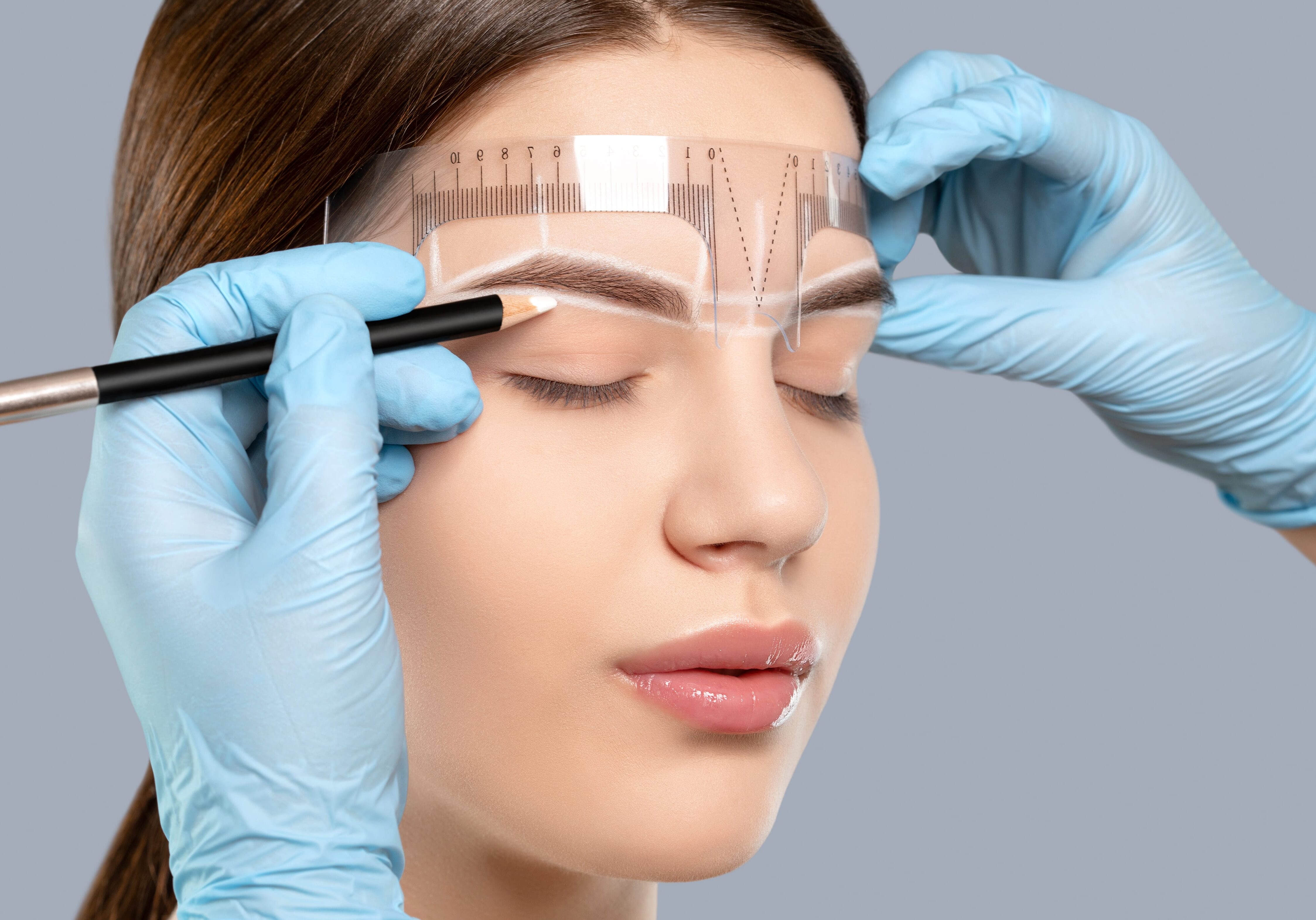 Permanent,Make-up,For,Eyebrows,Of,Beautiful,Woman,With,Thick,Brows Permanent make-up for eyebrows of beautiful woman